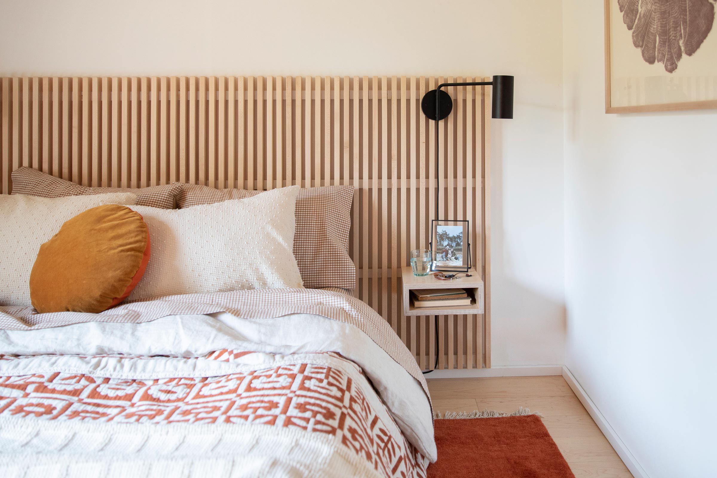 a plug-in wall sconce in a bedroom.