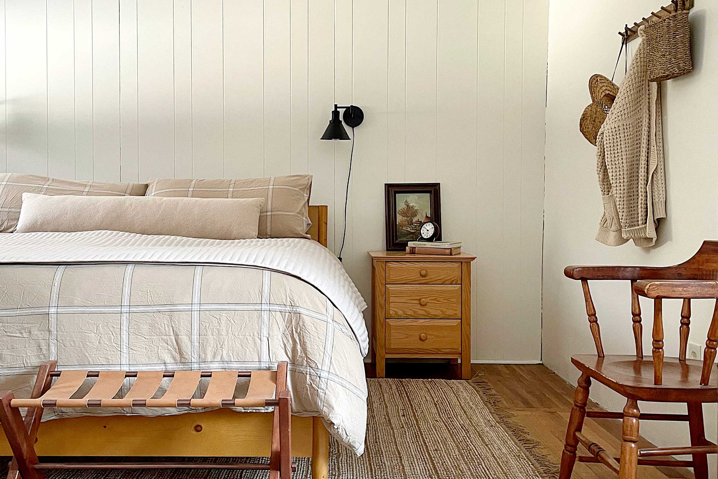 A cozy bed in a cabin.