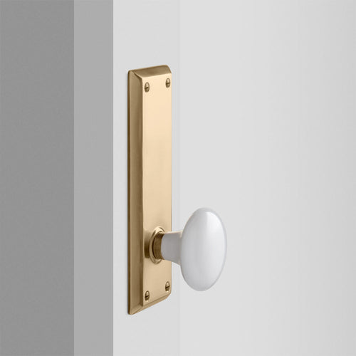 Freeport Large Backplate Doorset with Porcelain Knob - Antique Brass:hover