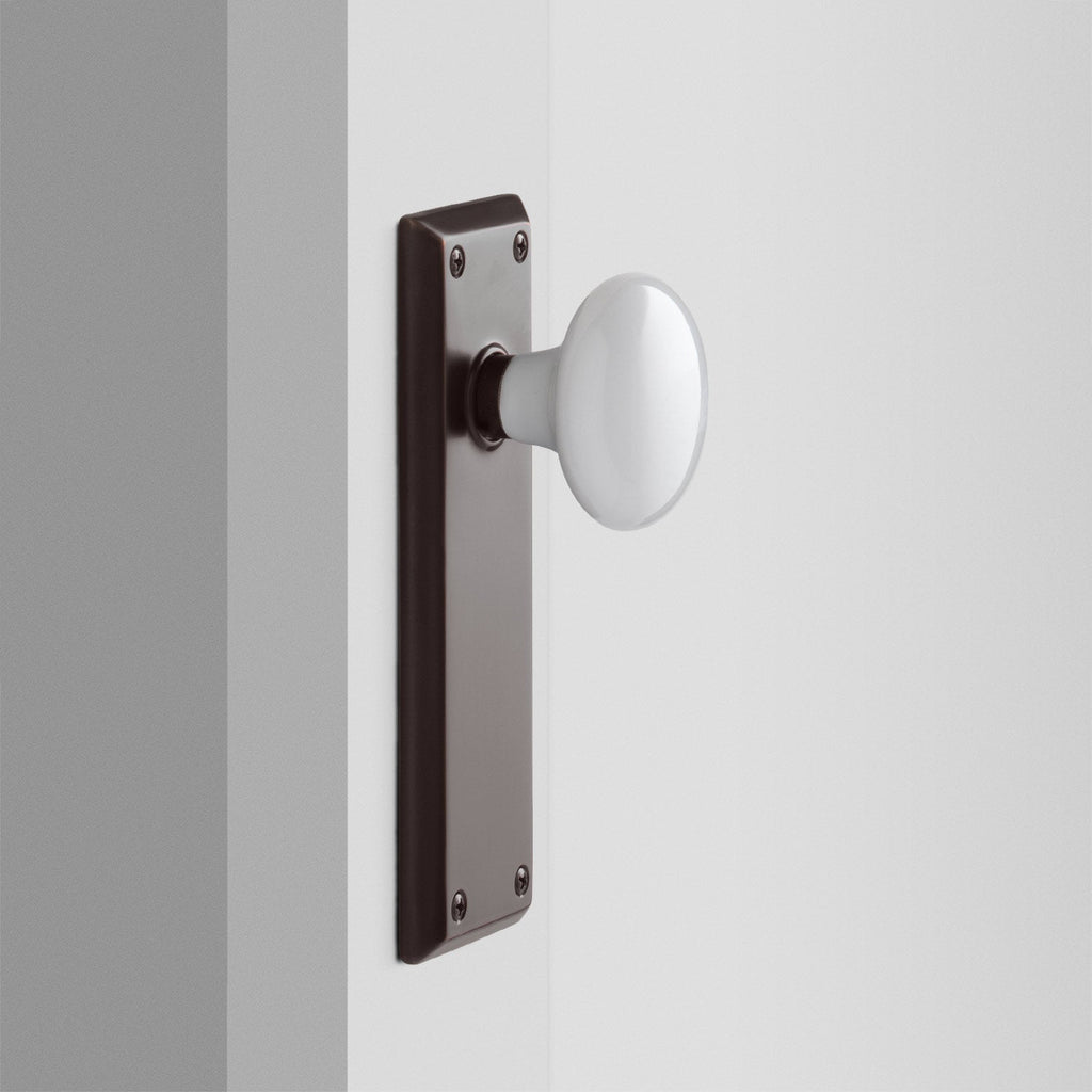 Freeport Large Backplate Doorset with Porcelain Knob - Oil Rubbed Bronze